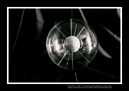 ENTITA' VIII V'98/III '99 - combustione di tela dipinta con tecnica mista. Diametro nucleo sfera ceneri cm 8, diametro sfera esterna plexiglass cm 25