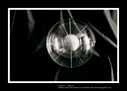 ENTITA' IX V'98/IV '99 - combustione di tela dipinta con tecnica mista. Diametro nucleo sfera ceneri cm 8,8, diametro sfera esterna plexiglass cm 25