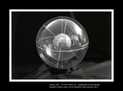 ENTITA' XIII VI-VIII'98/VI '99 - combustione di tela dipinta. Diametro nucleo sfera ceneri cm 8,8, diametro sfera esterna plexiglass cm 25