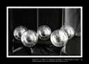 ENTITA' XVI X'98/IV '99 - combustione di disegno cm100x150 opera in 5 parti. Diametro nucleo sfera ceneri cm 6,9, diametro sfera esterna plexiglass cm 15,2