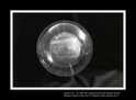 ENTITA' XXI XI'99/I'00 - combustione di tela dipinta ad olio. Diametro nucleo sfera ceneri cm 15,7, diametro sfera esterna plexiglass cm 25